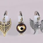"Magical Must-Haves: Unveil the Charm of Harry Potter 3-Pair Earring Set with Deathly Hallows and Golden Snitch Designs" Harry Potter Jewelry, 3 Pair Earrings Sets Flash Plated, Silver Plated Studs – Deathly Hallows and Golden Snitch